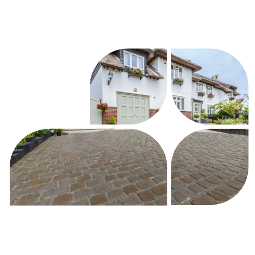 Cobbled driveway installed in front of a traditional home, with curved edging and surrounding planting beds.